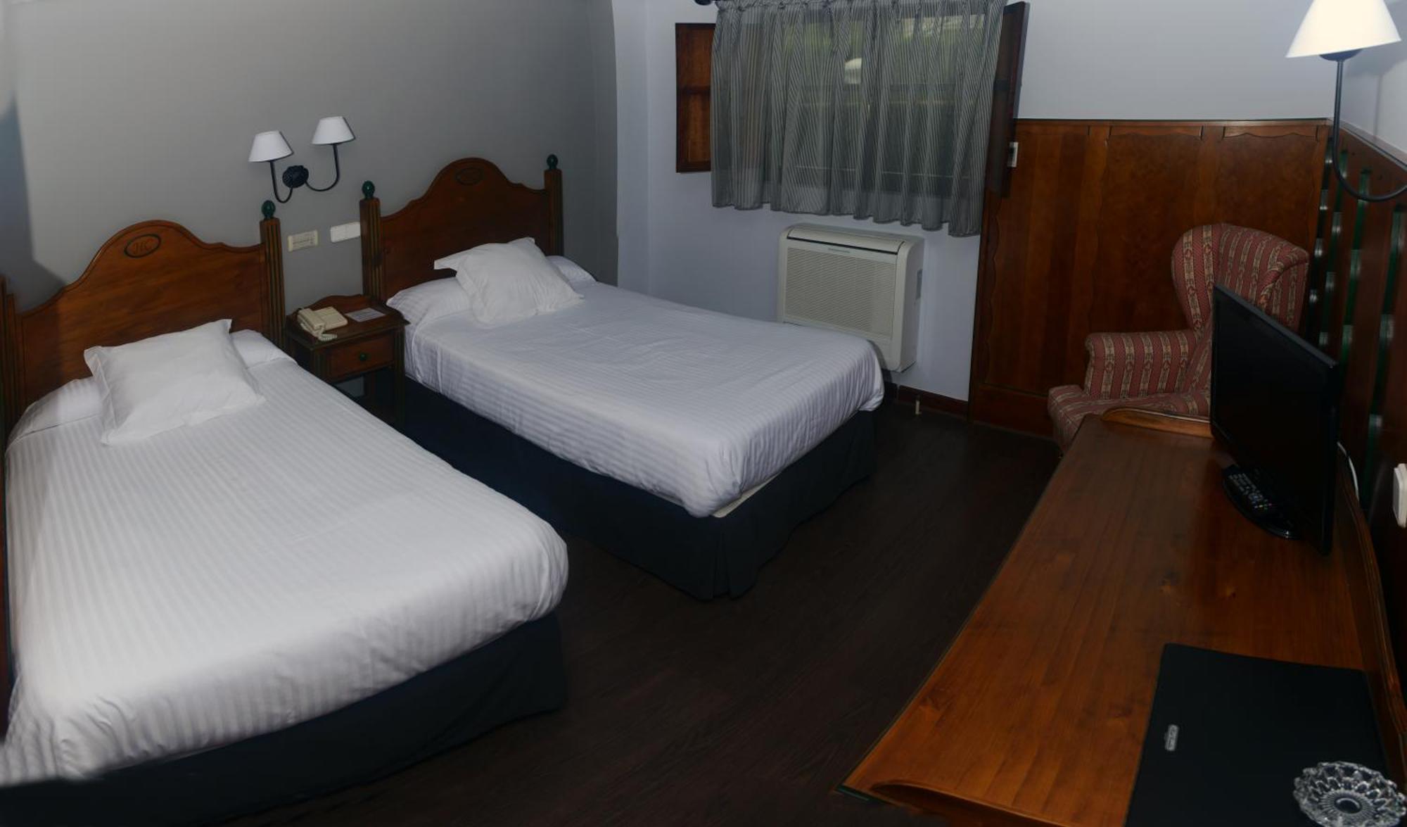 Hotel Comillas Szoba fotó